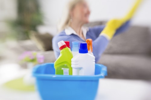 Professional cleaner in SW6 preparing a property for a move-out clean